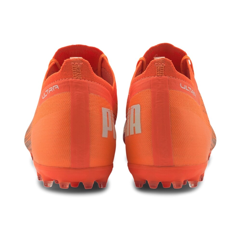 Puma ULTRA 1.1 MG Fotballsko Chasing Adrenaline Pack