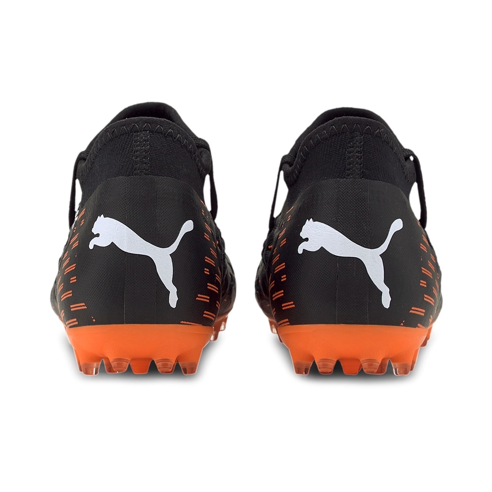 Puma FUTURE 6.3 NETFIT MG Fotballsko Barn Chasing Adrenaline Pack